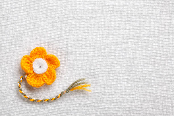 istock Knitted flower decoration 584203522