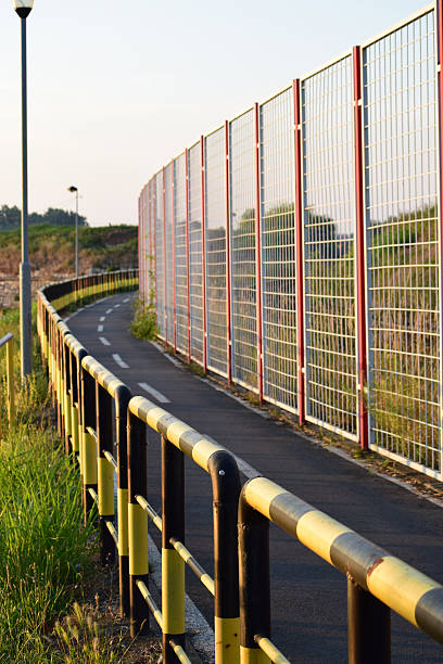 istock high and low railing on the cycling track 584203836