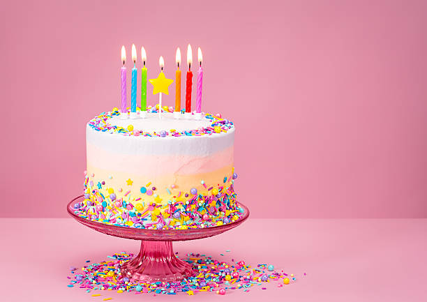 istock Colorful Birthday Cake with Sprinkles 584204900