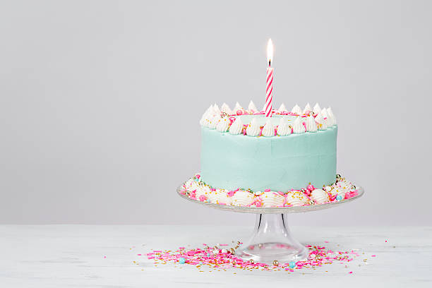 istock Pastel Blue Birthday Cake over White Background. 584205014