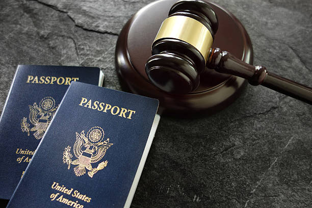Gavel and passports US passports and judges legal gavel emigration and immigration stock pictures, royalty-free photos & images