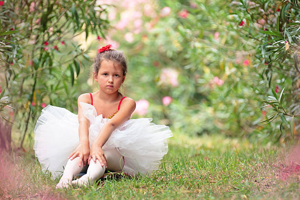 istock Small ballerina in the park. 584210208