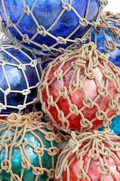 Round Glass Japanese Fishing Floats With Nets Stock Photo - Download Image  Now - Fishing Bobber, Glass - Material, Backgrounds - iStock