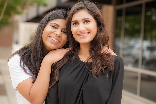 istock Two young sisters of South Asian ethnicity 584211884