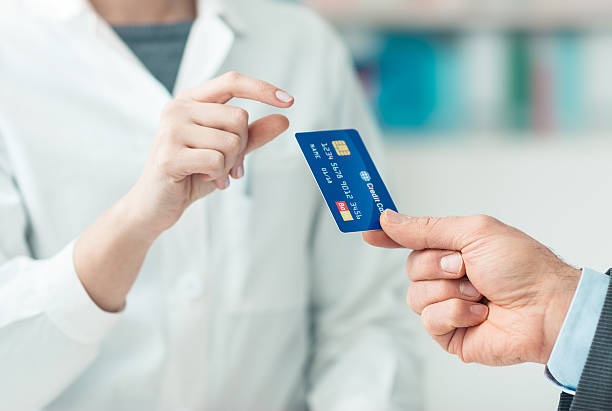 istock Man shopping with a credit card 584211936