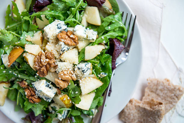 istock Green Salad with Pears, Blue Cheese, Walnuts 584214150