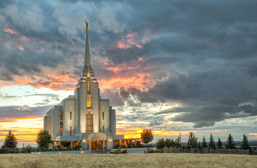 Pocatello Idaho LDS Mormon Latter-day Saint Temple with sky clouds flowers and trees
