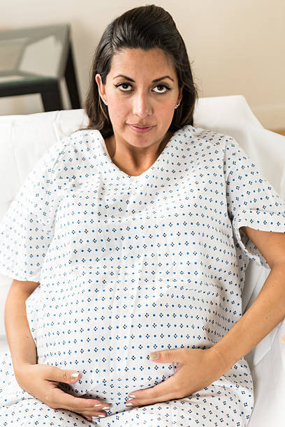 istock Pregnant hispanic woman 584215474