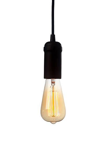 istock Glowing vintage light bulb isolated on white 584217188