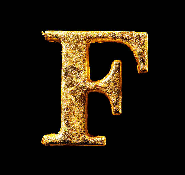 istock Alphabet and numbers in gold leaf 584217262