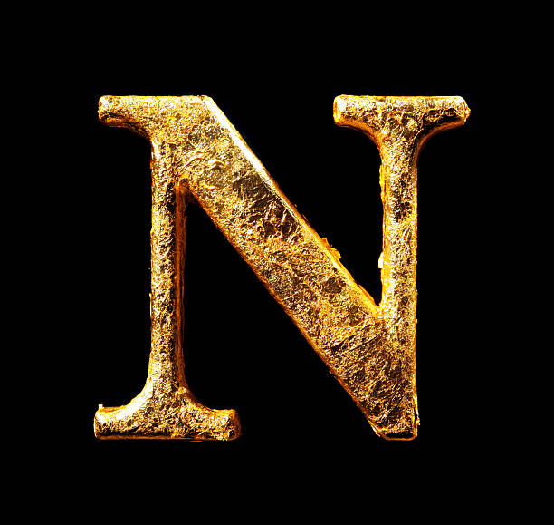 istock Alphabet and numbers in gold leaf 584217302