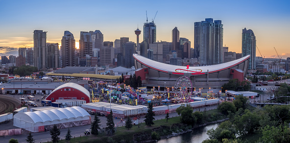 Calgary, Canada - July 8, 2016: Panoramic view of the the Calgary Stampede at sunset on July 8, 2016 in Calgary, Alberta. The Calgary Stampede is often called the greatest outdoor show on Earth.