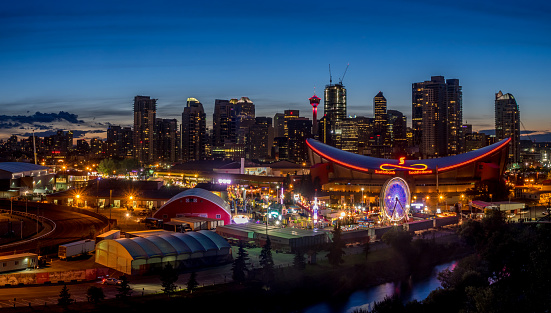 Calgary, Canada - July 8, 2016: Panoramic view of the the Calgary Stampede at sunset on July 8, 2016 in Calgary, Alberta. The Calgary Stampede is often called the greatest outdoor show on Earth.