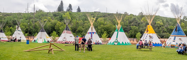 Calgary, Canada - July 9, 2016: View of Tipis in the Indian Village at the Calgary Stampede on July 9, 2016 in Calgary, Alberta. The Indian Village represents First Nations people at the Calgary Stampede.