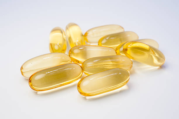 istock Omega 3 capsules from Fish Oil on white background. 584219666