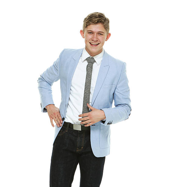 istock Smiling male standing and looking at camera 584220716