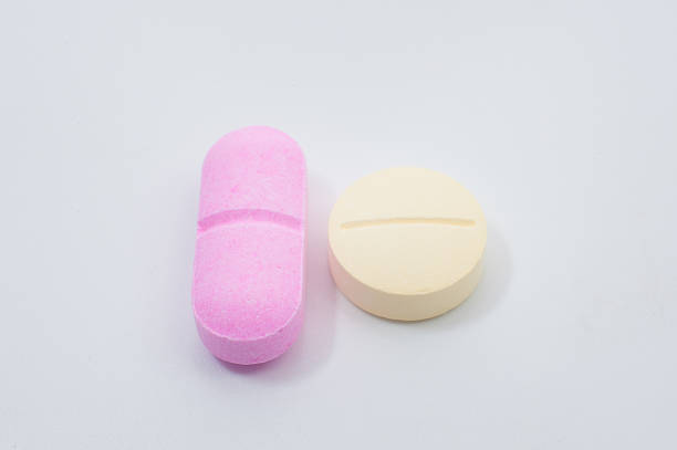 istock Many colorful medicines. Pills and capsules on white background 584220912