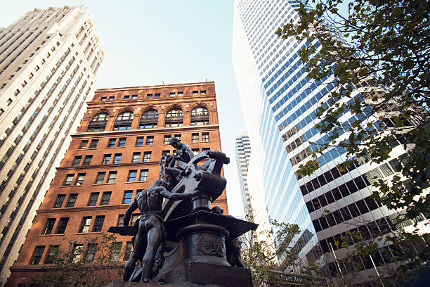 The Mechanics Monument, built in 1901, also known as The Mechanics, Mechanics Statue, or Mechanics Fountain since it featured a pool of water at the base during the first five years, is a bronze sculpture group by Douglas Tilden, located at the intersection of Market, Bush and Battery Streets in San Francisco, California, United States.