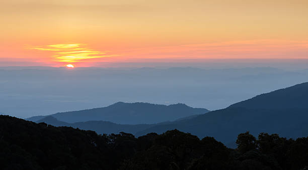 istock Stunning view of sunrise with mountain ranges 584223634