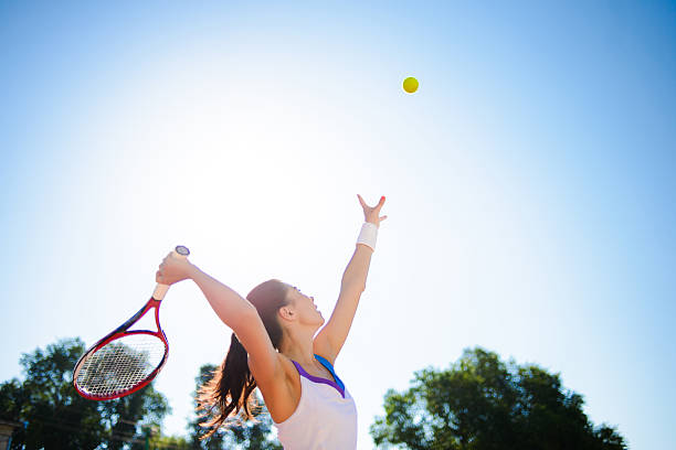 istock Young woman playing tennis. 584228588