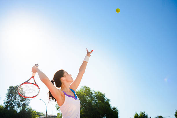istock Young woman playing tennis. 584228772