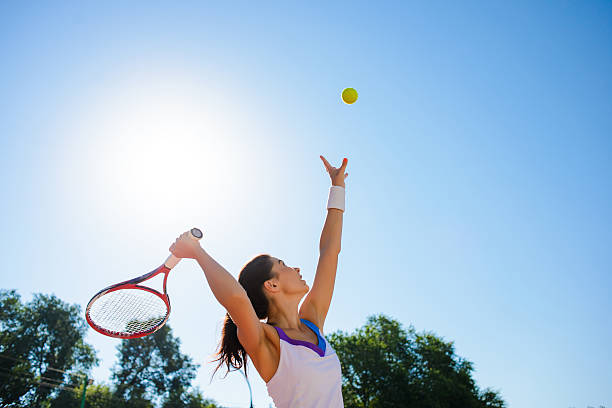 istock Young woman playing tennis. 584229022