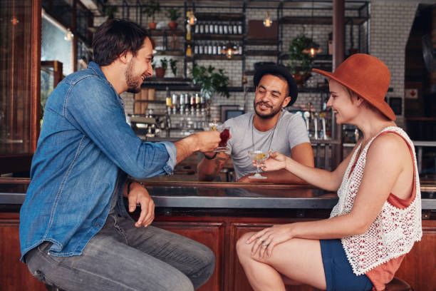 istock Young modern people in coffee shop having drinks 584230502