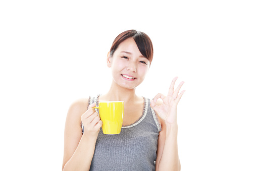 Woman drinking a cup of coffee