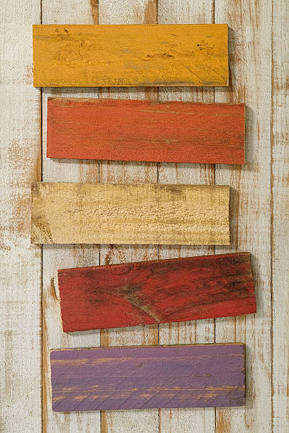 istock Old colourful weathered wood signs. 584231812