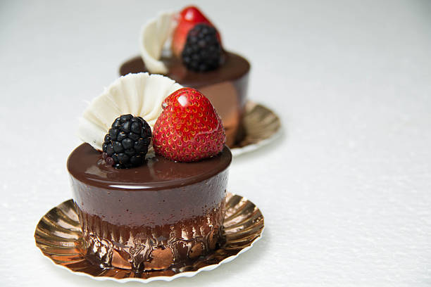 istock delicious small chocolate cake with some fruits on top 584232764