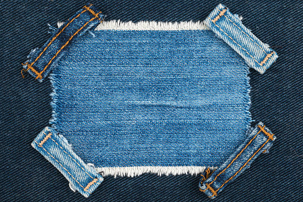 istock Frame with two straps jeans, lies on the blue denim 584232830