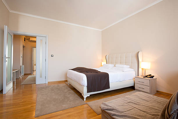istock Modern elegant hotel bedroom interior 584233592