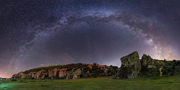 istock Milky way at Dobrogea Gorge in Romania, panorama 584234402