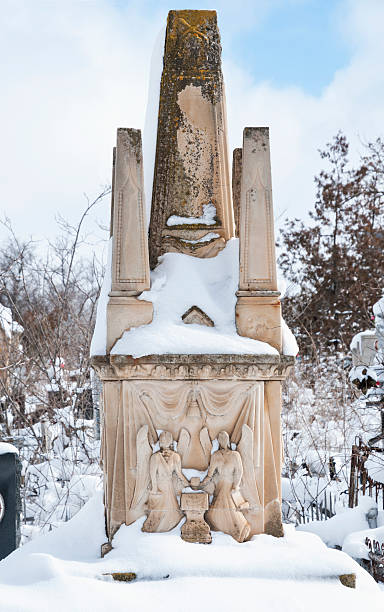 istock Old tombstone over the grave. 584239188