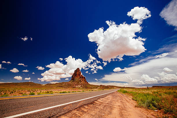 istock Agathla Peak, Highway 163, Arizona, USA 584239360