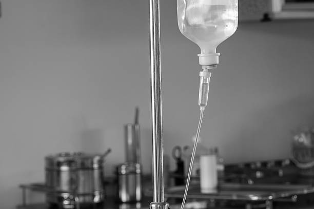 istock IV drip chamber, tubing, and bag of solution 584240394