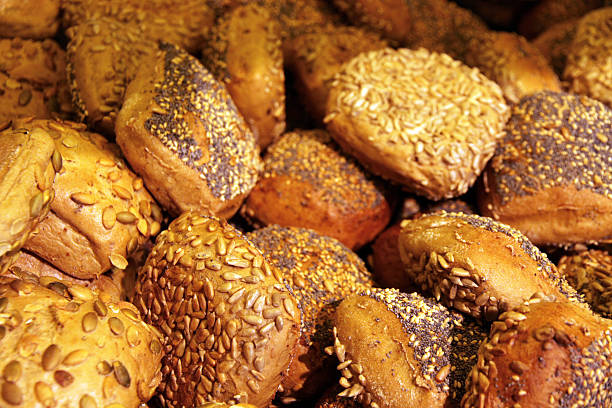 istock Variety of freshly baked rolls in a bakery 584242008