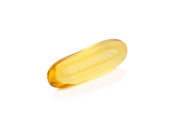 istock Omega 3 capsules from Fish Oil on white background 584244652