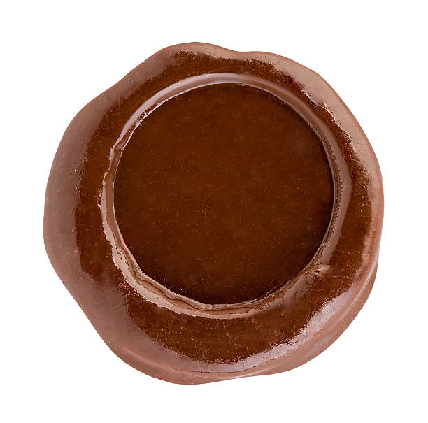 istock Brown wax seal close-up isolated on a white background. 584245272
