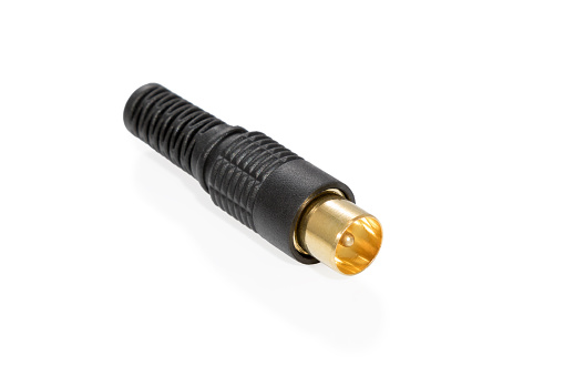 Black TV plug with a copper tip isolated on a white background
