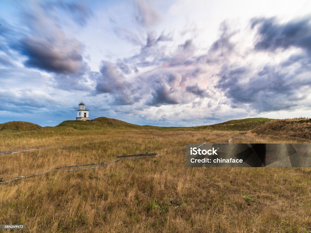 Cattle Point Lighthouse Cattle Point Lighthouse on San Juan Island, WA USA,  with large clouds. San Juan Island Stock Photo