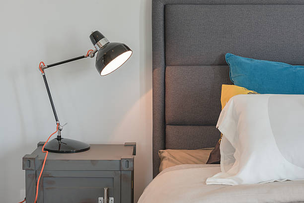 istock modern black lamp on table side in modern bedroom 584249586