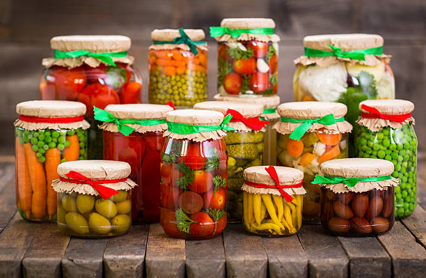 istock Preserved vegetables in the jars 584464582