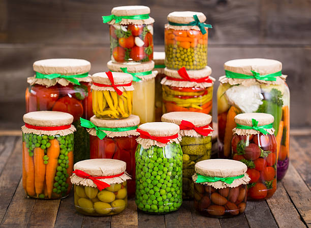 istock Preserved vegetables in the jars 584464628