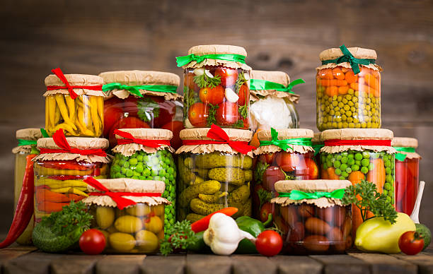 istock Preserved vegetables in the jars 584464692