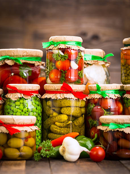 istock Preserved vegetables in the jars 584464698