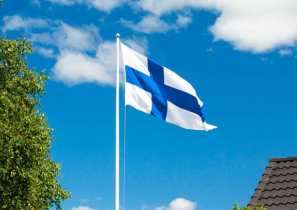 istock Flag of Finland on sky background. 584464914