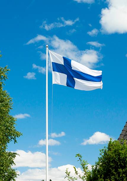 istock Flag of Finland on sky background. 584465486