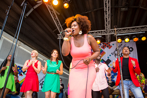 Amsterdam, the Netherlands – July 23, 2016: ZO gospel choir performing at the open air theater in Vondelpark for the Euro Pride Pink Saturday celebrations