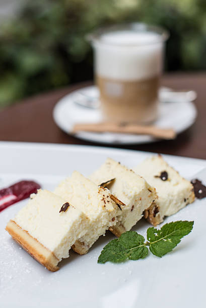 istock Cheesecake is delicious on a plate with coffee 584465842